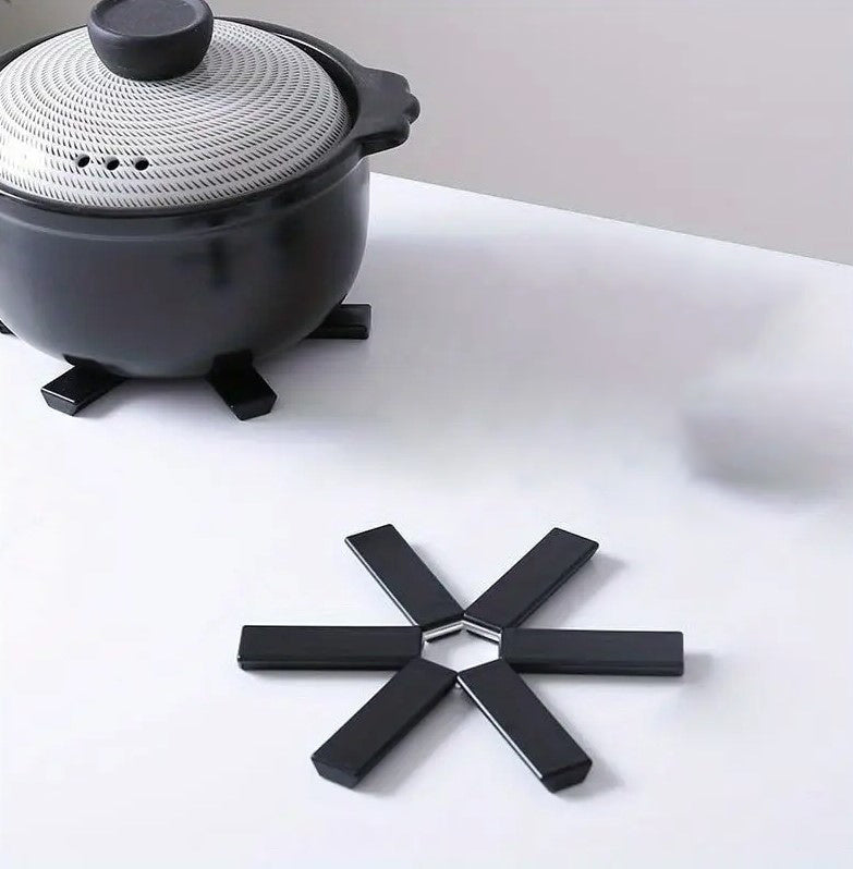 Suport pliabil pentru vase fierbinti, Zola®, negru, 19 cm, rezistent la temperaturi de pana la 200 grade, grosime 1 cm Suport pliabil pentru vase fierbinti, Zola®, negru, 19 cm, rezistent la temperaturi de pana la 200 grade, grosime 1 cm